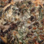 Mushroom and Truffle Oil Pizza with Wild Herbs